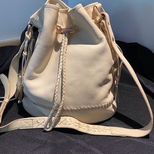 Butter soft leather bucket bag in Ivory with taupe accents